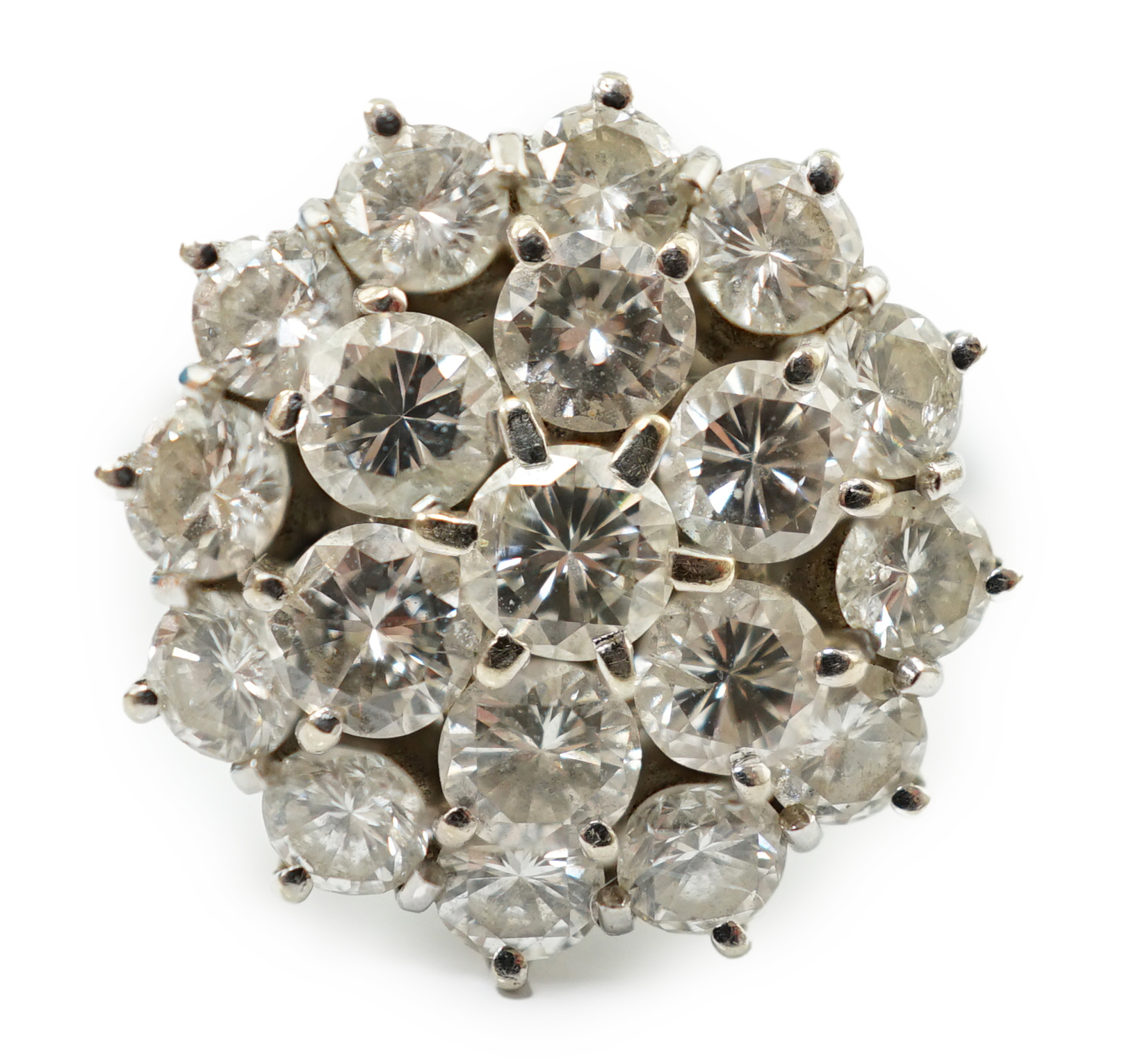 An 18ct white gold and diamond set flower head cluster ring